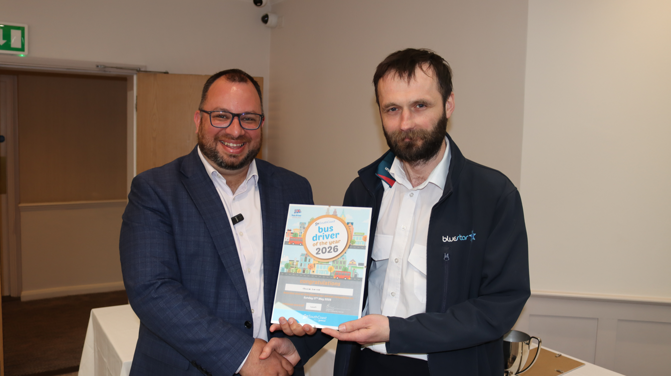Grzegorz Dziob from Unilink receiving a certificate