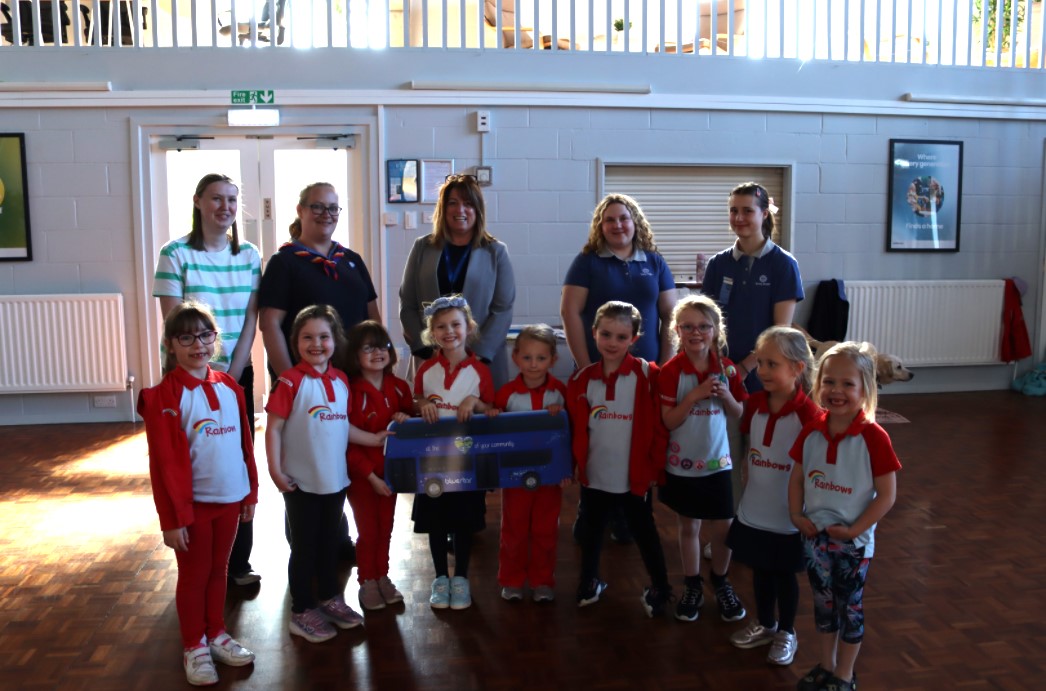 Lordshill Rainbows and leaders holding Bluestar bus cut out