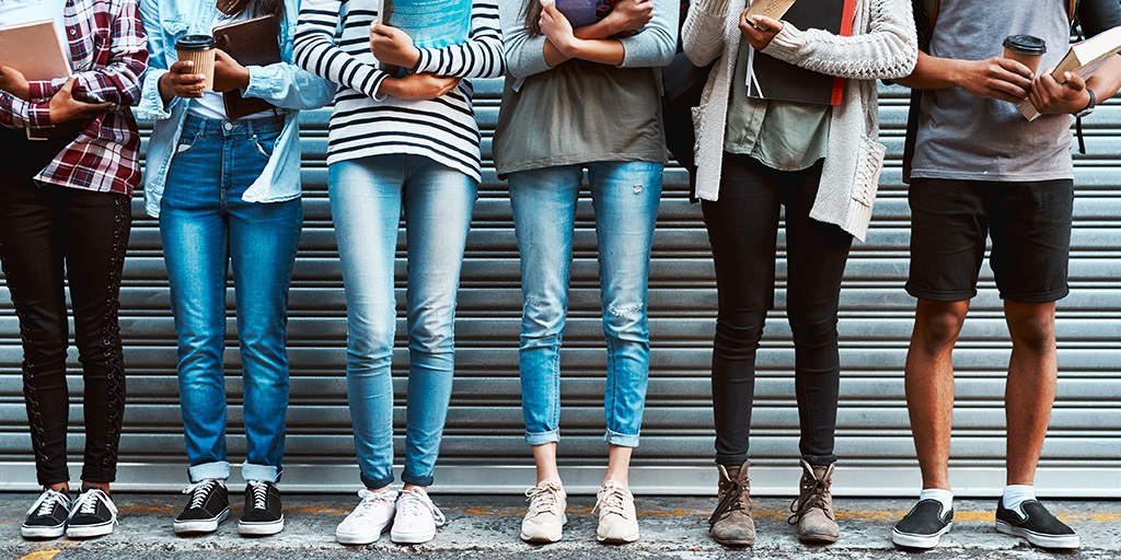 legs of college students press photo